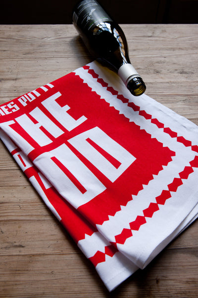 I love to cook with wine tea towel